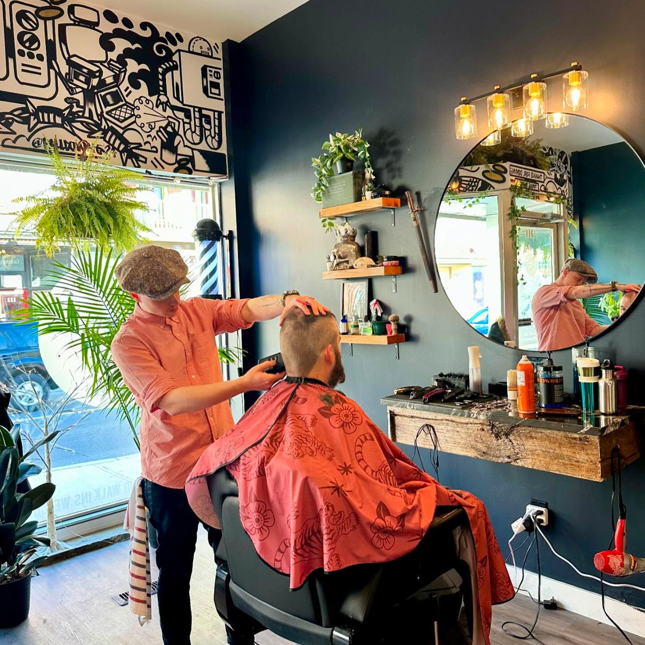 A man getting his hair cut at local Barber shop